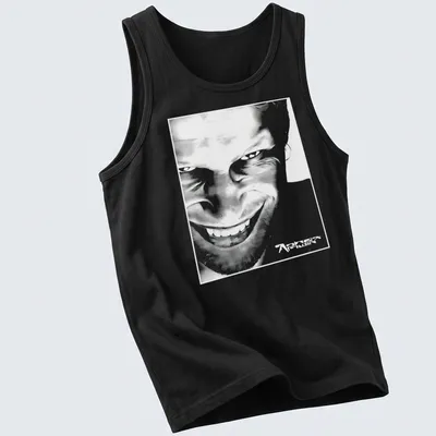 Black and white abstract graphic of Aphex Twin face with printed text. — printed on a tank top