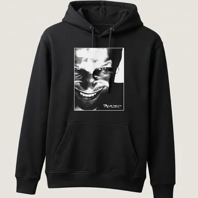 Black and white abstract graphic of Aphex Twin face with printed text. — printed on a unisex hoodie