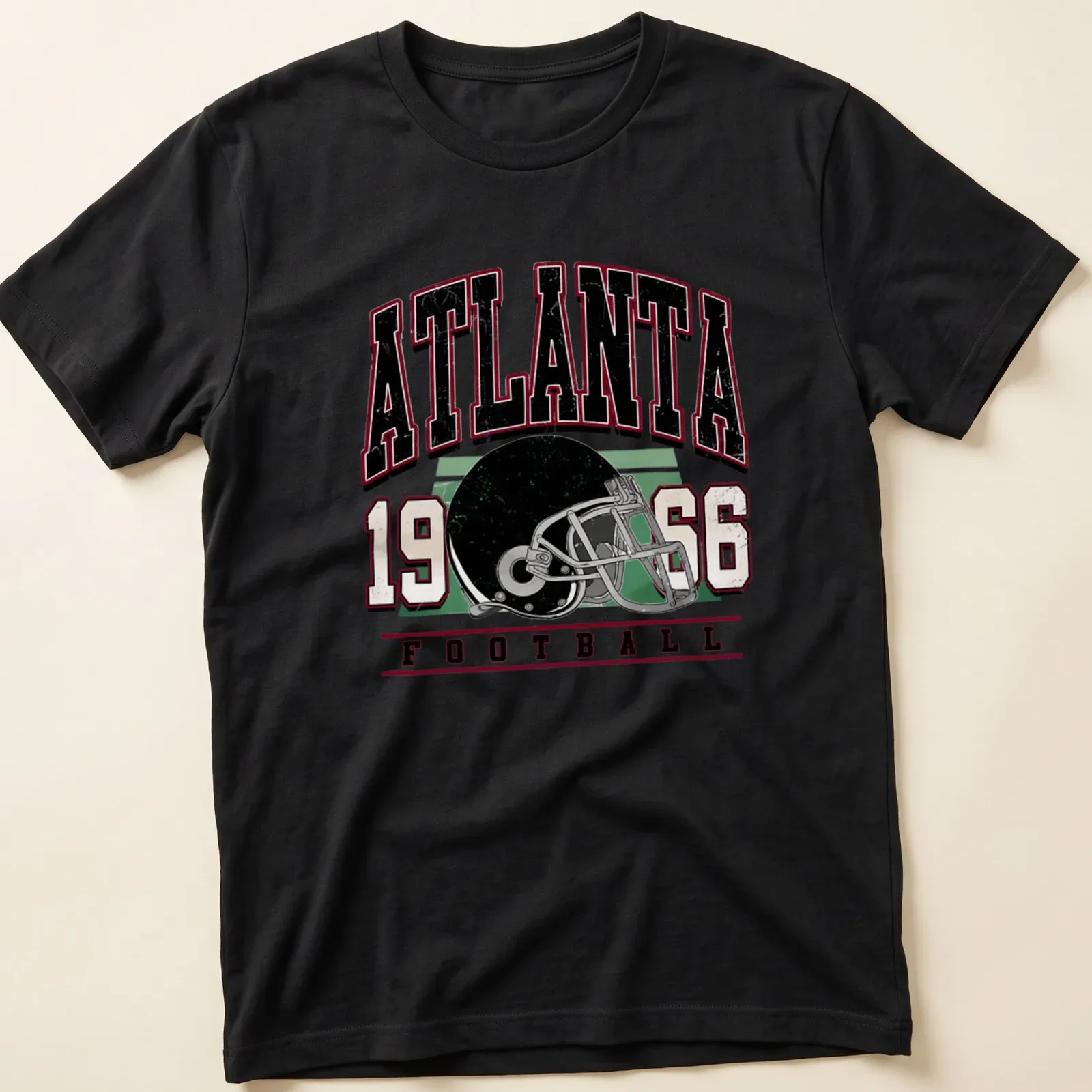 Vintage retro Atlanta Football t-shirt featuring a helmet and bold text — printed on a unisex t-shirt