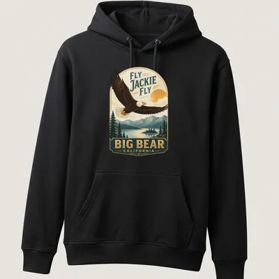 Vintage design featuring a bald eagle soaring with text about Big Bear, California. — printed on a unisex hoodie