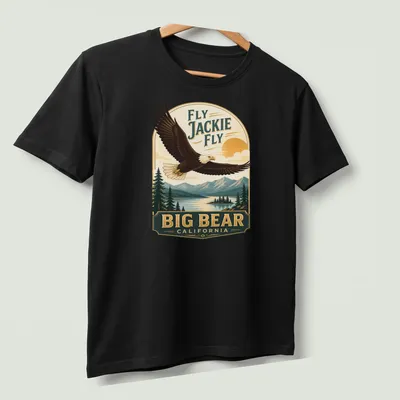 Vintage design featuring a bald eagle soaring with text about Big Bear, California. — printed on a unisex t-shirt (angled view)