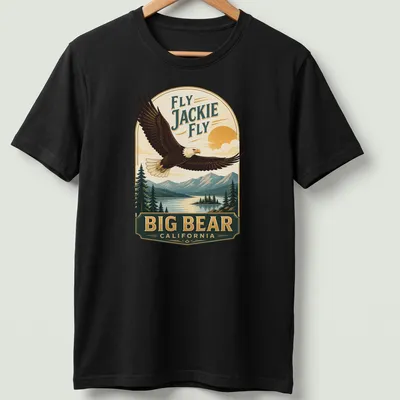 Vintage design featuring a bald eagle soaring with text about Big Bear, California.