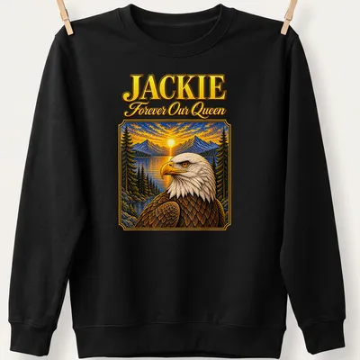 Vintage-style t-shirt featuring a bald eagle with text honoring Jackie. — printed on a unisex sweatshirt
