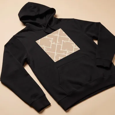 Chinoiserie bamboo lattice design on a neutral T-shirt in beige and cream — printed on a unisex hoodie