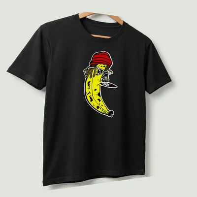 Cartoon banana with dreadlocks and sunglasses above 'Fortunate Youth' text. — printed on a unisex t-shirt (angled view)