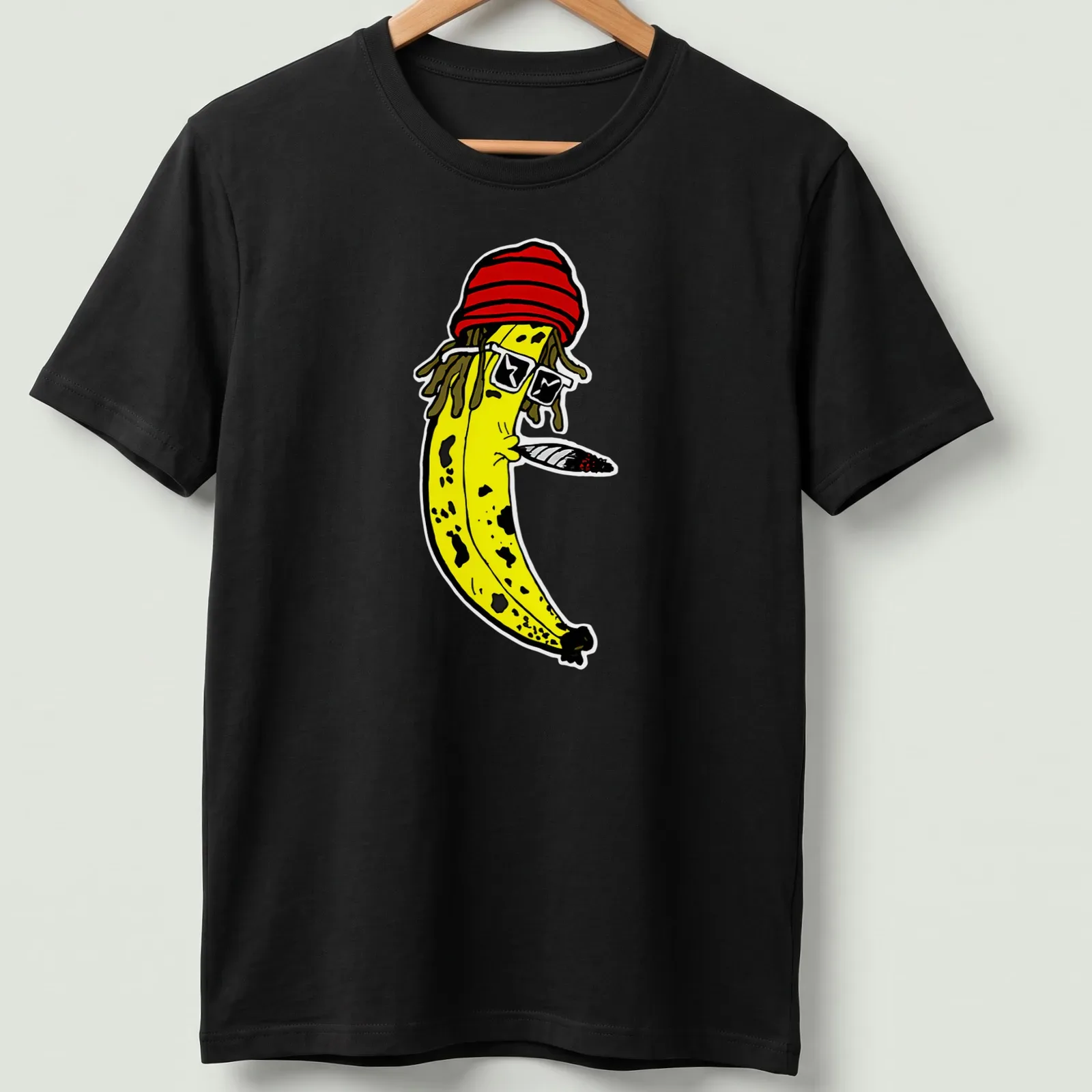Cartoon banana with dreadlocks and sunglasses above 'Fortunate Youth' text. — printed on a unisex t-shirt