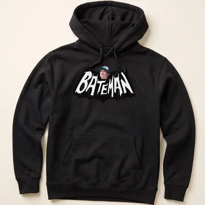 Bold Bateman text in black and white on a graphic — printed on a unisex hoodie