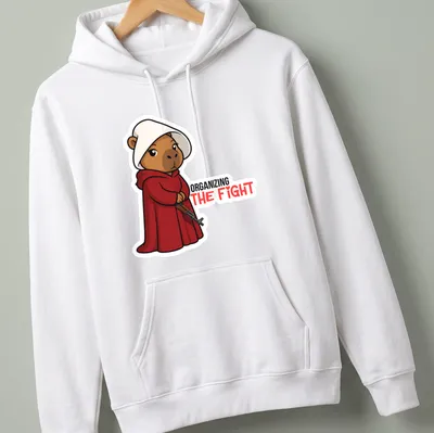 Kawaii bear in a red cloak with the phrase 'ORGANIZING THE FIGHT' printed above. — printed on a unisex hoodie