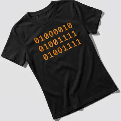 Bold Halloween t-shirt with 'Boo' text and binary code design — printed on a women's shirt