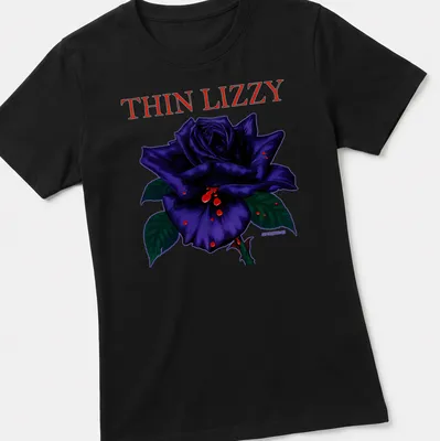 Illustration of a black rose with THIN LIZZY text, featuring purple, red, and green colors. — printed on a women's shirt