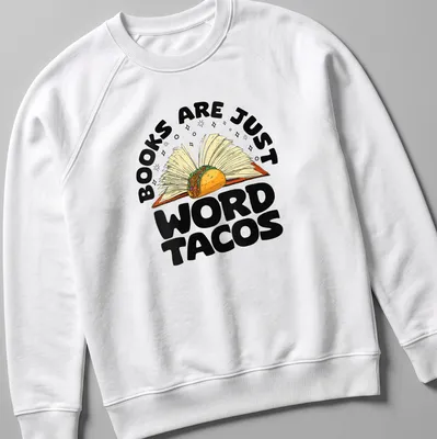Colorful cartoon of an open book holding a taco with humorous text — printed on a unisex sweatshirt