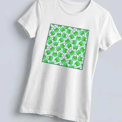 Cute candy corn pattern in green, light blue, and white on a — printed on a women's shirt