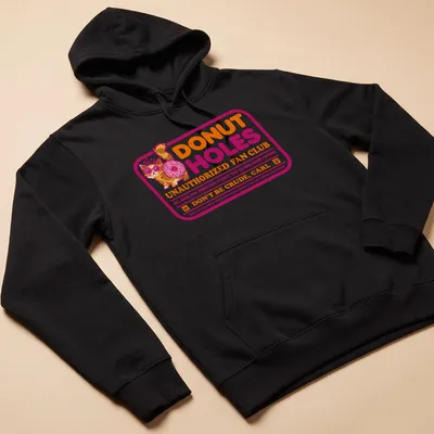 Colorful cartoon graphic of a cat with sunglasses and donut on a humorous — printed on a unisex hoodie