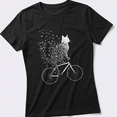 Whimsical line-art of a cat on a bicycle surrounded by butterflies in black and white — printed on a women's shirt