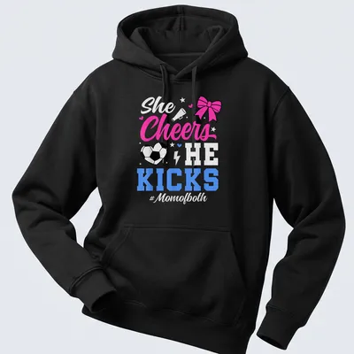 Colorful shirt with text 'She Cheers He Kicks #Momofboth' and graphics of pom-poms and a soccer ball — printed on a unisex hoodie
