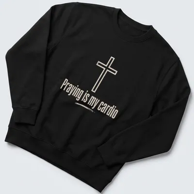 Minimalist design featuring a Christian cross and text about prayer as cardio — printed on a unisex sweatshirt