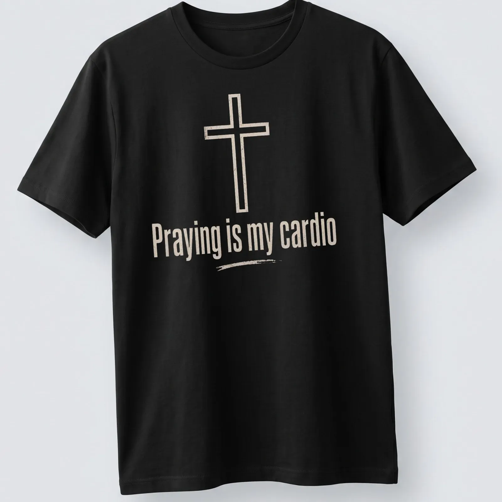 Minimalist design featuring a Christian cross and text about prayer as cardio — printed on a unisex t-shirt