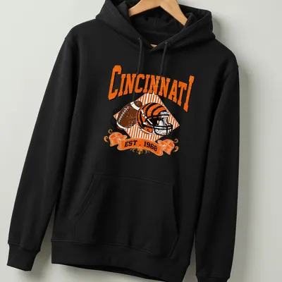 Vintage Cincinnati Football t-shirt featuring a helmet and football illustration — printed on a unisex hoodie