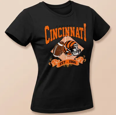 Vintage Cincinnati Football t-shirt featuring a helmet and football illustration — printed on a women's shirt