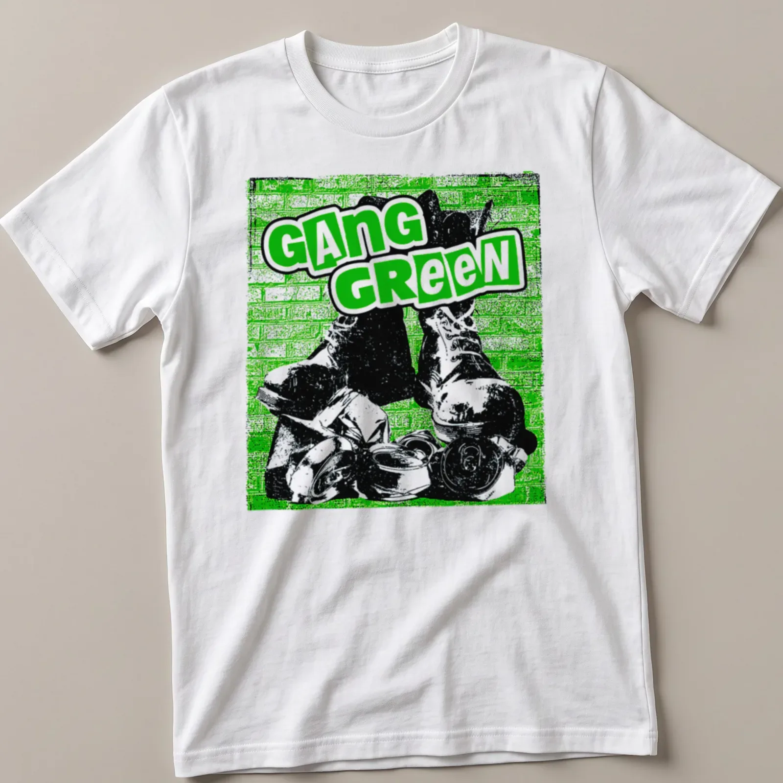 Edgy graphic t-shirt featuring combat boots and bold Gang Green text — printed on a unisex t-shirt
