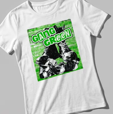 Edgy graphic t-shirt featuring combat boots and bold Gang Green text — printed on a women's shirt