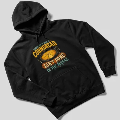 Vintage rustic T-shirt featuring cornbread in a skillet with humorous text about cooking. — printed on a unisex hoodie