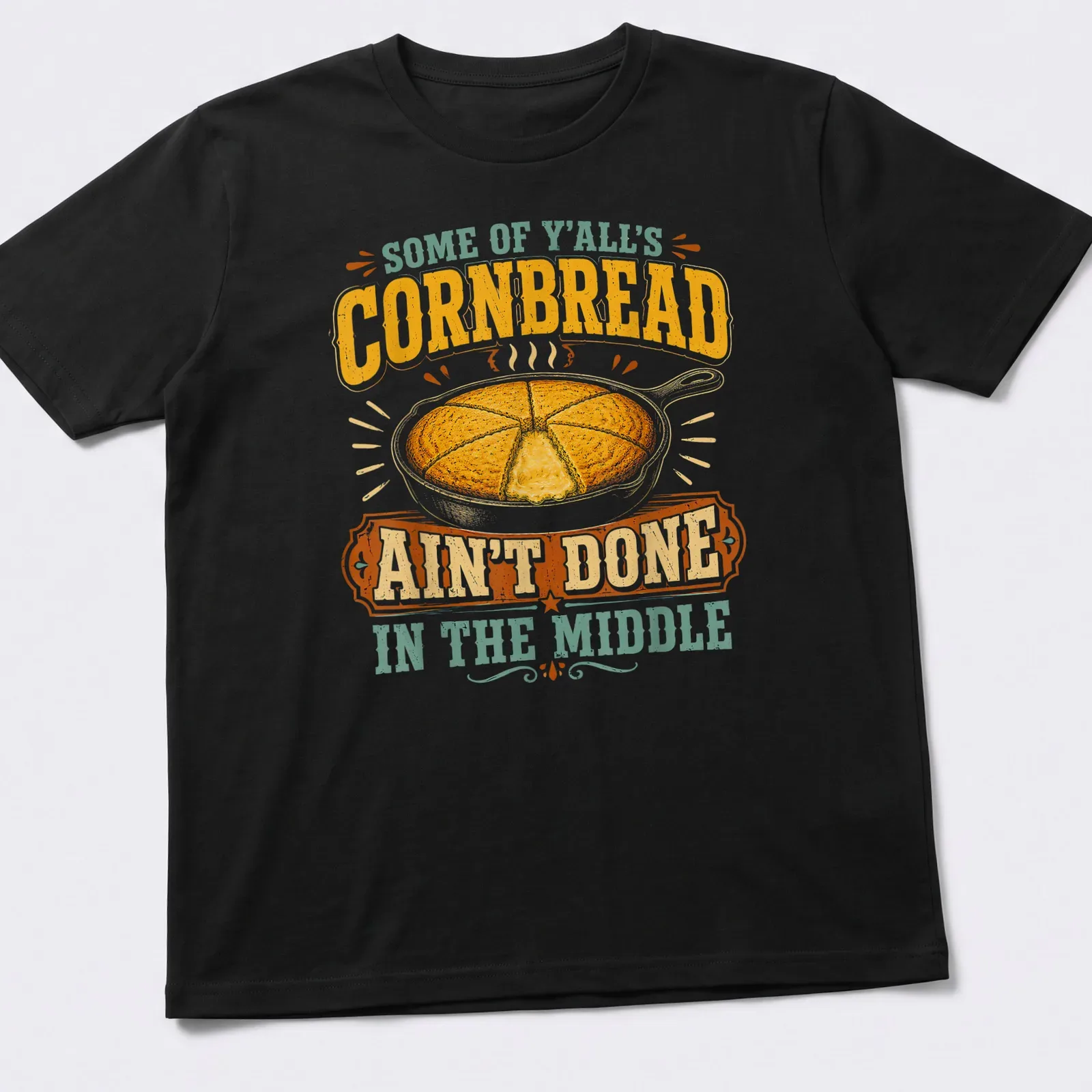 Vintage rustic T-shirt featuring cornbread in a skillet with humorous text about cooking. — printed on a unisex t-shirt