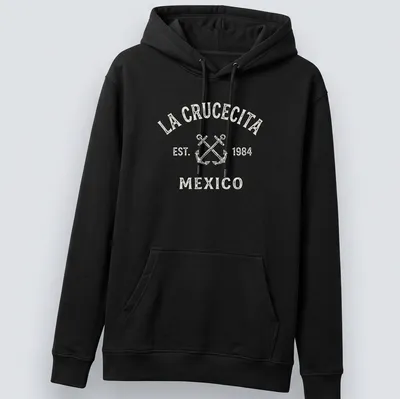 Vintage print of crossed boat anchors with La Crucecita Mexico text — printed on a unisex hoodie
