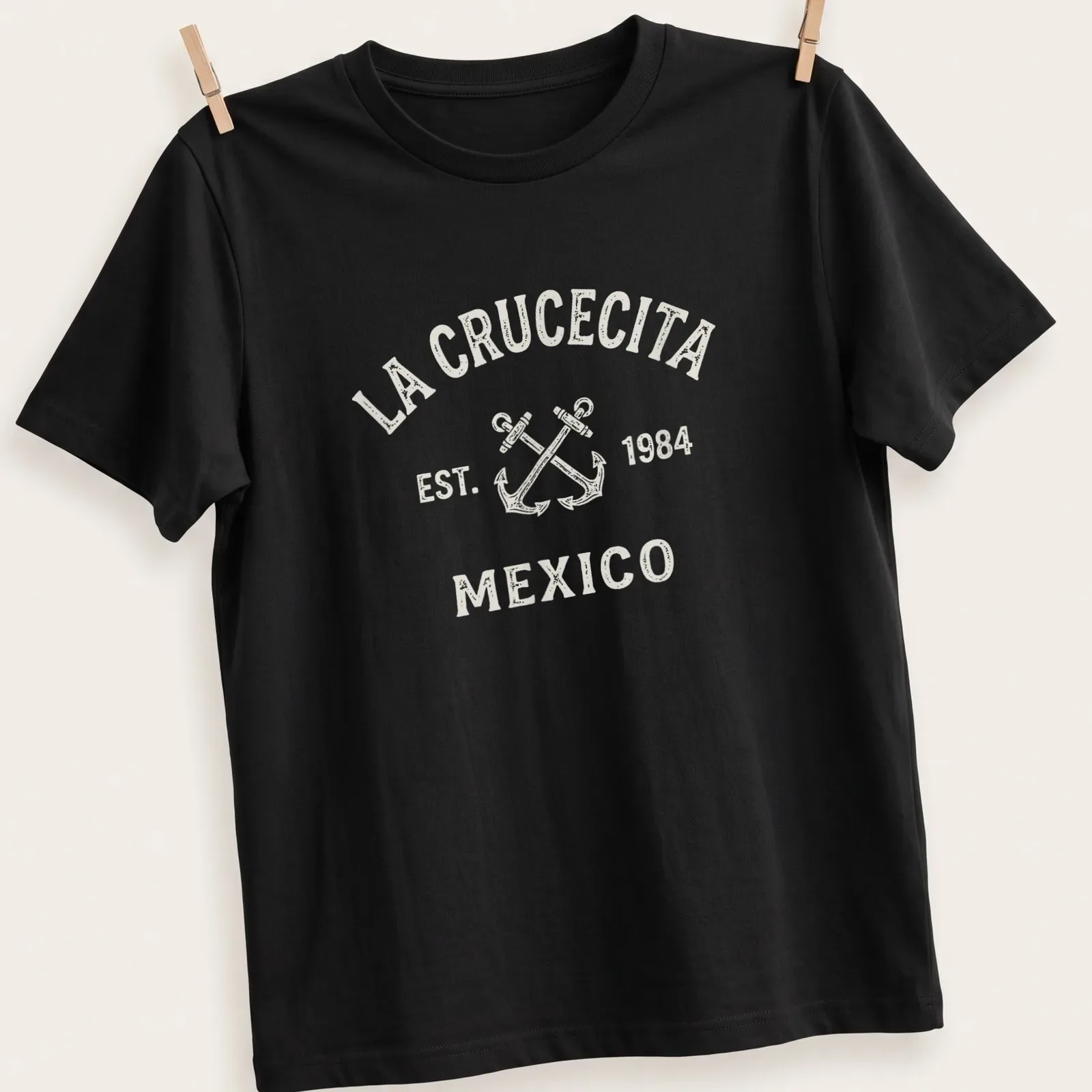 Vintage print of crossed boat anchors with La Crucecita Mexico text — printed on a unisex t-shirt