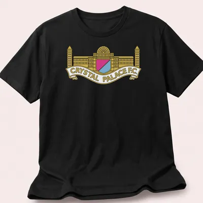 Bold graphic Crystal Palace F.C. crest logo in gold, pink, light blue, and white — printed on a unisex t-shirt