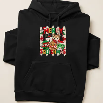Kawaii style t-shirt featuring cute holiday characters and Merry Squishmas text — printed on a unisex hoodie