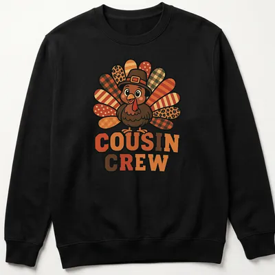 Cartoon turkey design with 'Cousin Crew' text, bright colors for Thanksgiving. — printed on a unisex sweatshirt