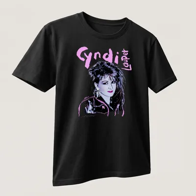 Retro Cyndi Lauper t-shirt with bold 80s typography in pink and purple — printed on a unisex t-shirt (angled view)