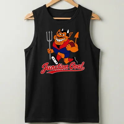 Cartoon Demons character running with a football and Junction Oval text — printed on a tank top