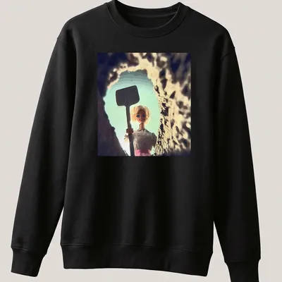 Distressed T-shirt featuring a whimsical doll face design in light blue and pink. — printed on a unisex sweatshirt