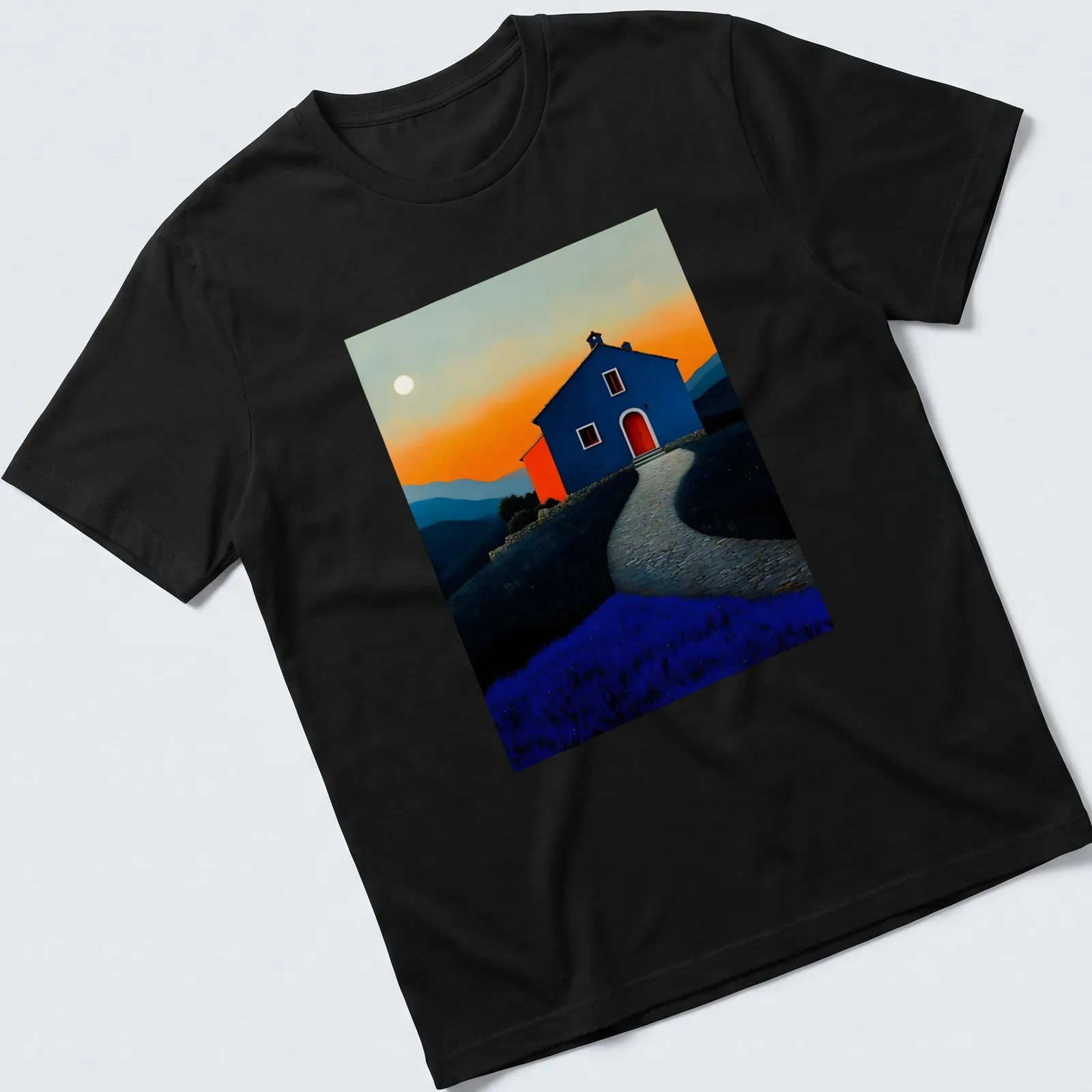 Dreamy landscape t-shirt with a blue house at sunset, featuring orange and lavender hues — printed on a unisex t-shirt