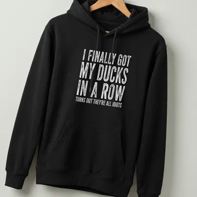 Vintage shirt with humorous text about ducks and disorganization — printed on a unisex hoodie