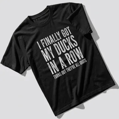 Vintage shirt with humorous text about ducks and disorganization