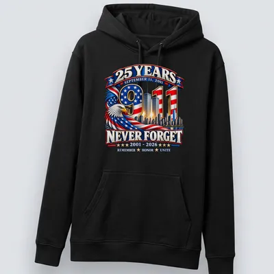 Patriotic eagle design honoring 9/11 with skyline and text — printed on a unisex hoodie