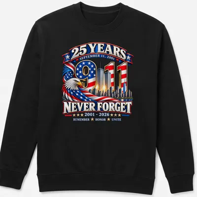 Patriotic eagle design honoring 9/11 with skyline and text — printed on a unisex sweatshirt