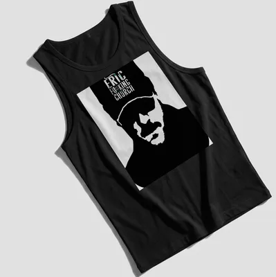 Bold graphic of Eric Church's silhouette with vibrant text in black, white, green, and blue. — printed on a tank top