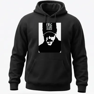 Bold graphic of Eric Church's silhouette with vibrant text in black, white, green, and blue. — printed on a unisex hoodie