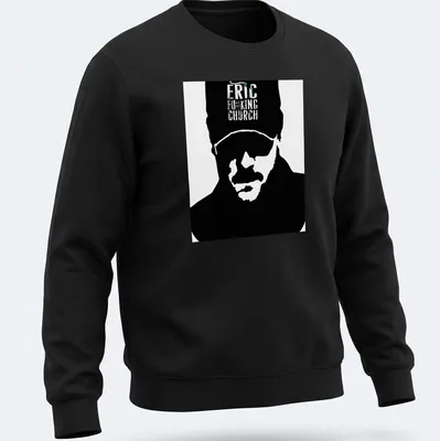 Bold graphic of Eric Church's silhouette with vibrant text in black, white, green, and blue. — printed on a unisex sweatshirt