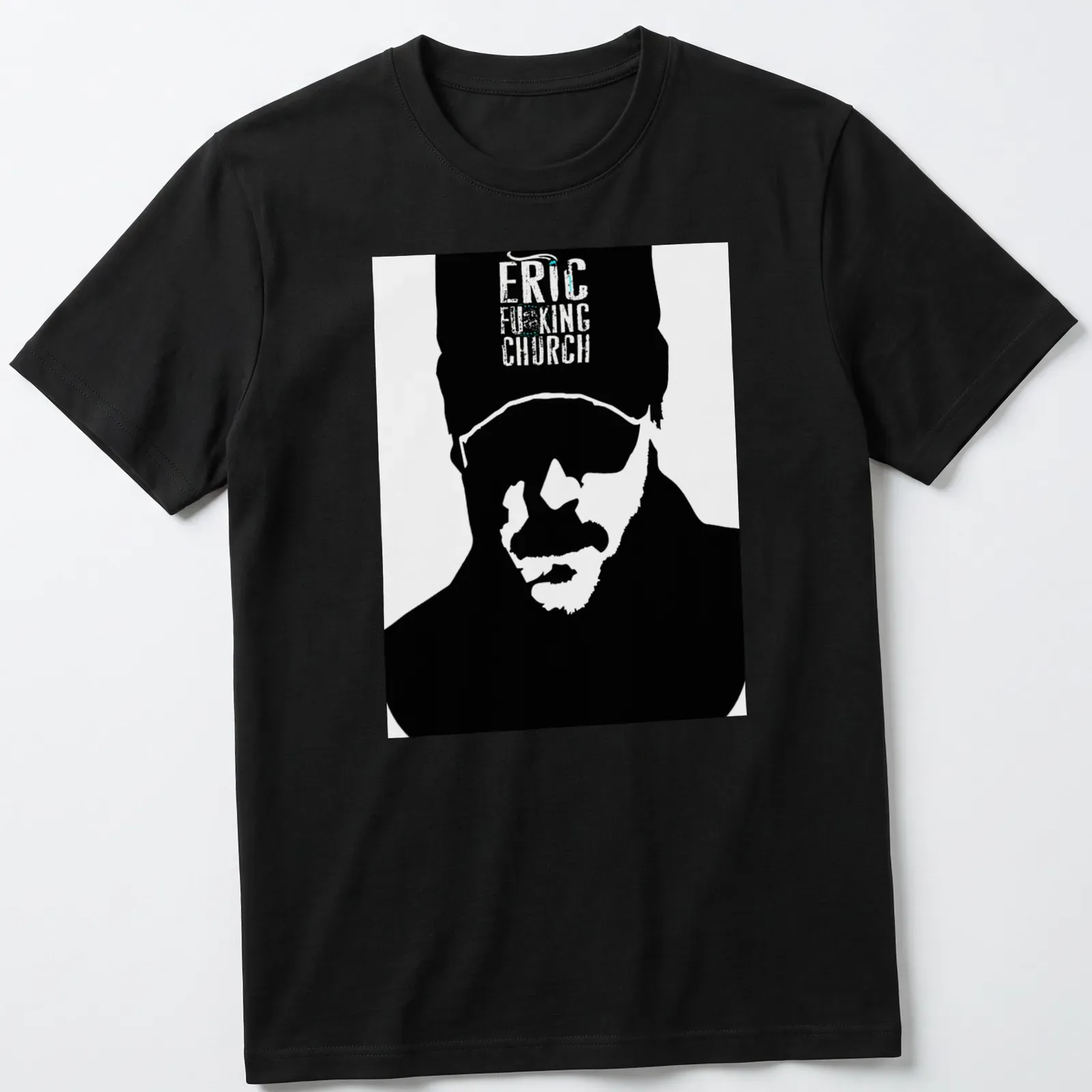Bold graphic of Eric Church's silhouette with vibrant text in black, white, green, and blue. — printed on a unisex t-shirt