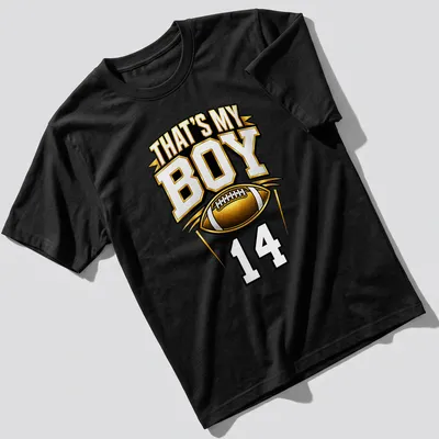 Bold typography t-shirt with text 'That's My Boy 14' in gold, black, and white