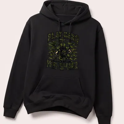 Camo patterned shirt with a football player and motivational text Play Hard Pray Harder — printed on a unisex hoodie