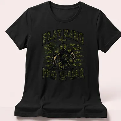 Camo patterned shirt with a football player and motivational text Play Hard Pray Harder — printed on a women's shirt
