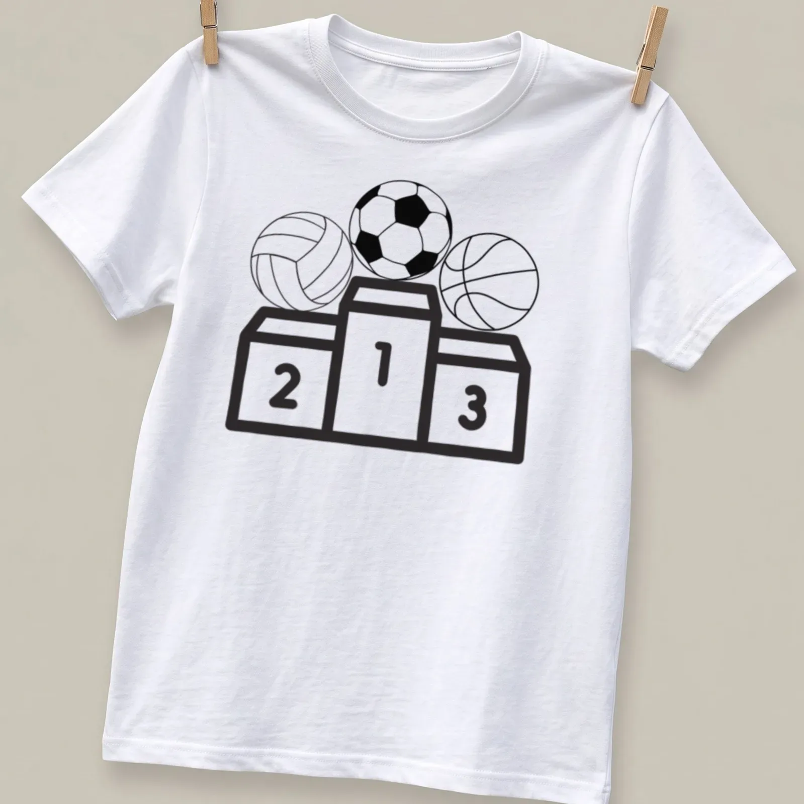 Line-art design of football, volleyball, and basketball icons on a podium — printed on a unisex t-shirt