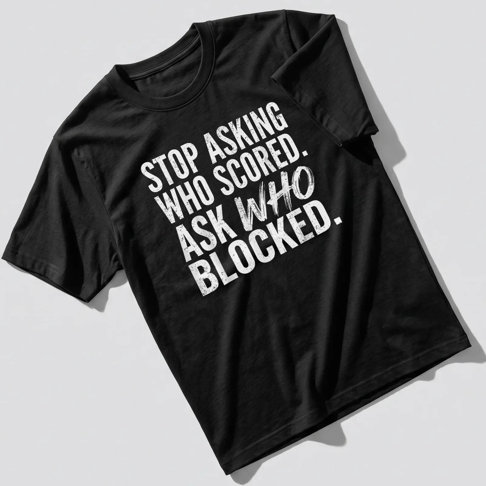 Bold typography humor shirt with text about scoring and blocking in white — printed on a unisex t-shirt