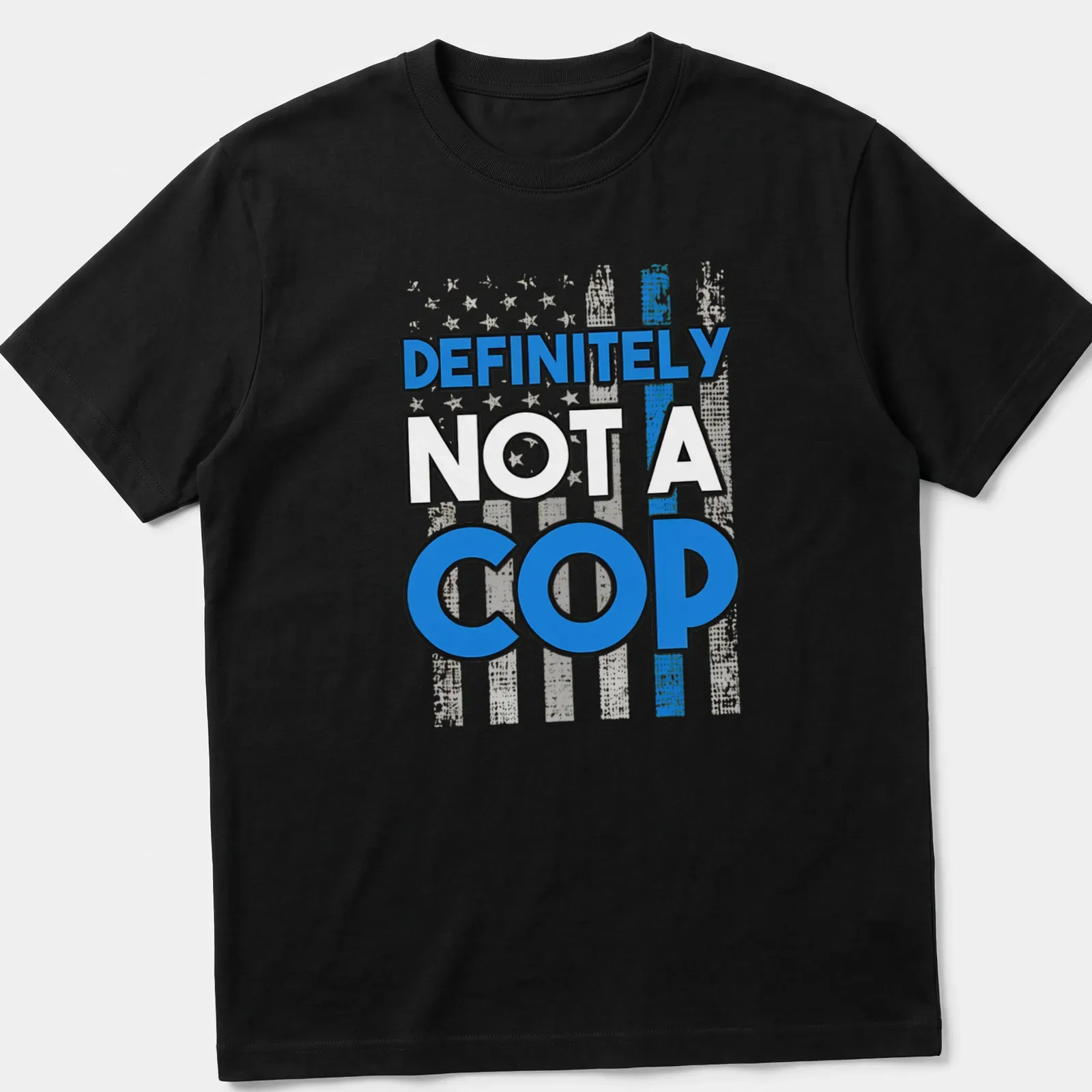 Bold design with humorous police flag and text reading Definitely Not A Cop — printed on a unisex t-shirt